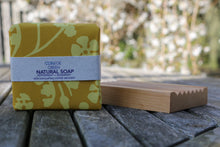 Handmade natural soaps: stack of five wrapped soaps