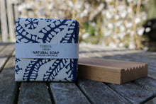 Wrapped bar of Lavender + Patchouli soap with wooden soap dish